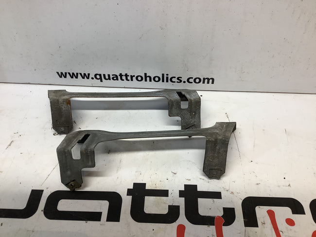 Headlight support brackets pair sloped