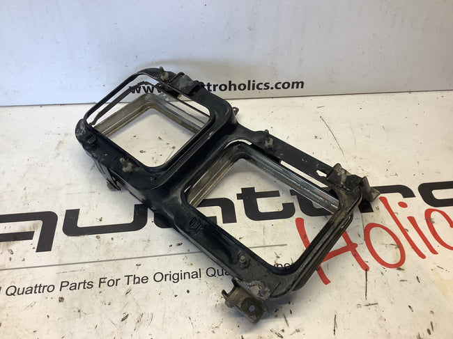 Early Quad Headlight Bracket Pair