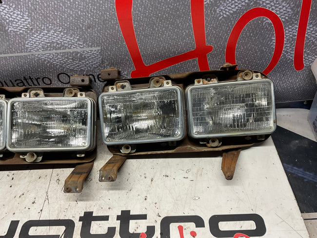 Early Quad Headlight Bracket Pair B2  4000 URQ Coupe