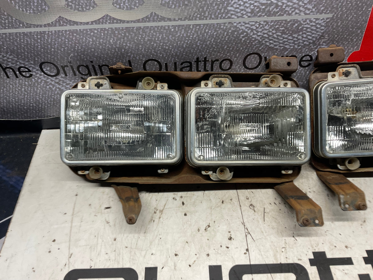 Early Quad Headlight Bracket Pair B2  4000 URQ Coupe