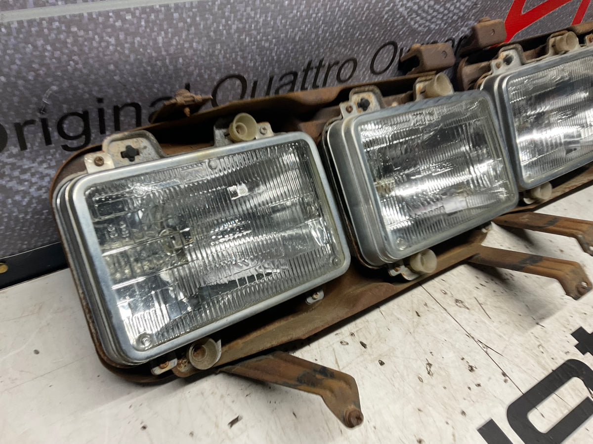 Early Quad Headlight Bracket Pair B2  4000 URQ Coupe