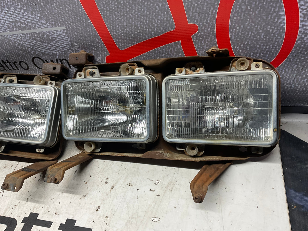 Early Quad Headlight Bracket Pair B2  4000 URQ Coupe