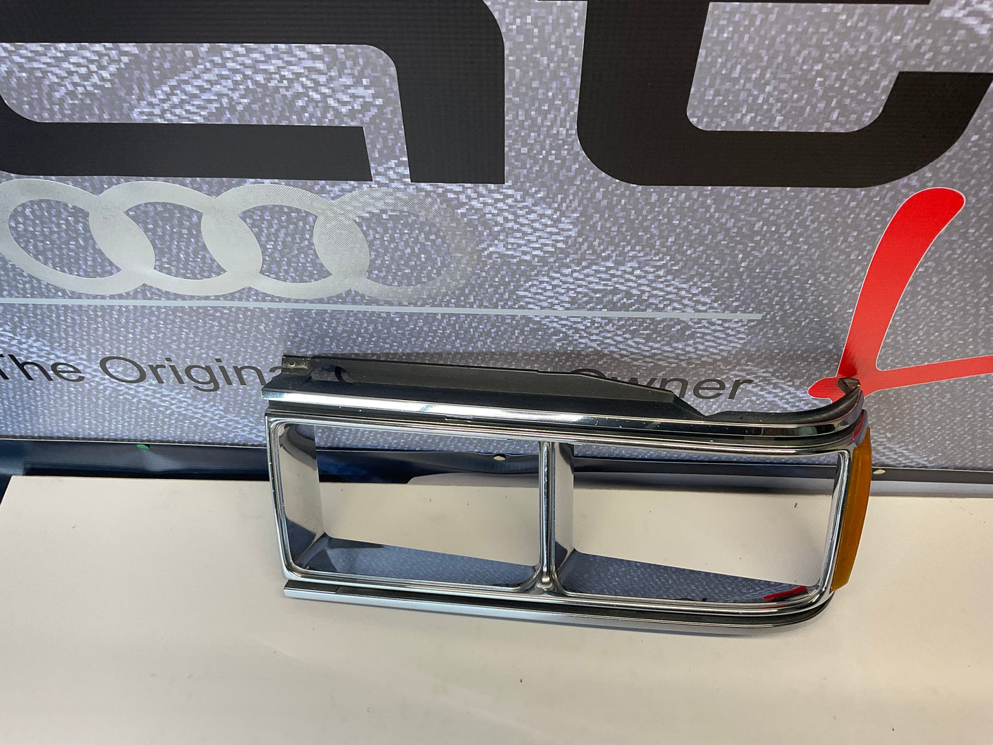 Driver Headlight Bezel 813941625C B2 URQ 4000  Chrome