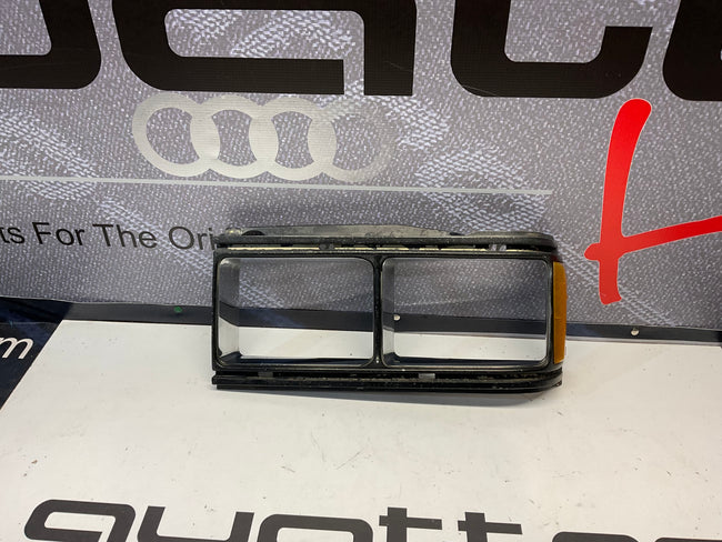 Driver Headlight Bezel 813941625C B2 URQ 4000 Black