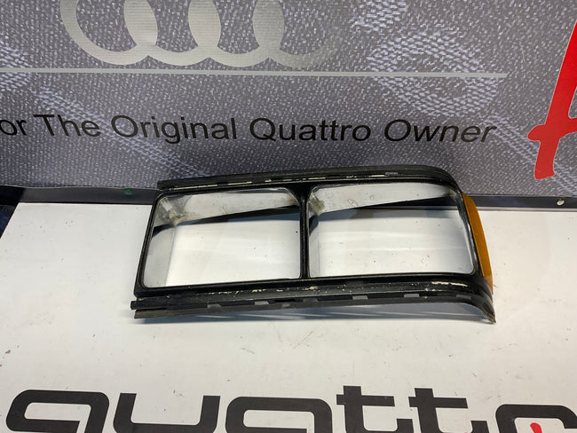 Driver Headlight Bezel 813941625C B2 URQ 4000 Black