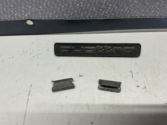 Front Grill Badge Quattro 853853736A  B2