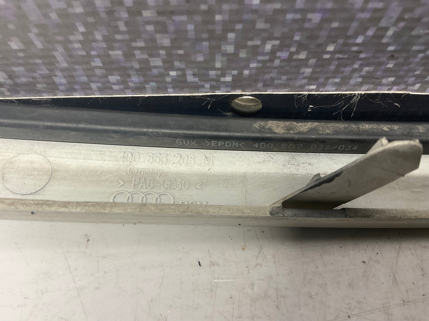 Passenger Headlight/Bumper Trim Right  4D0853208M  D2