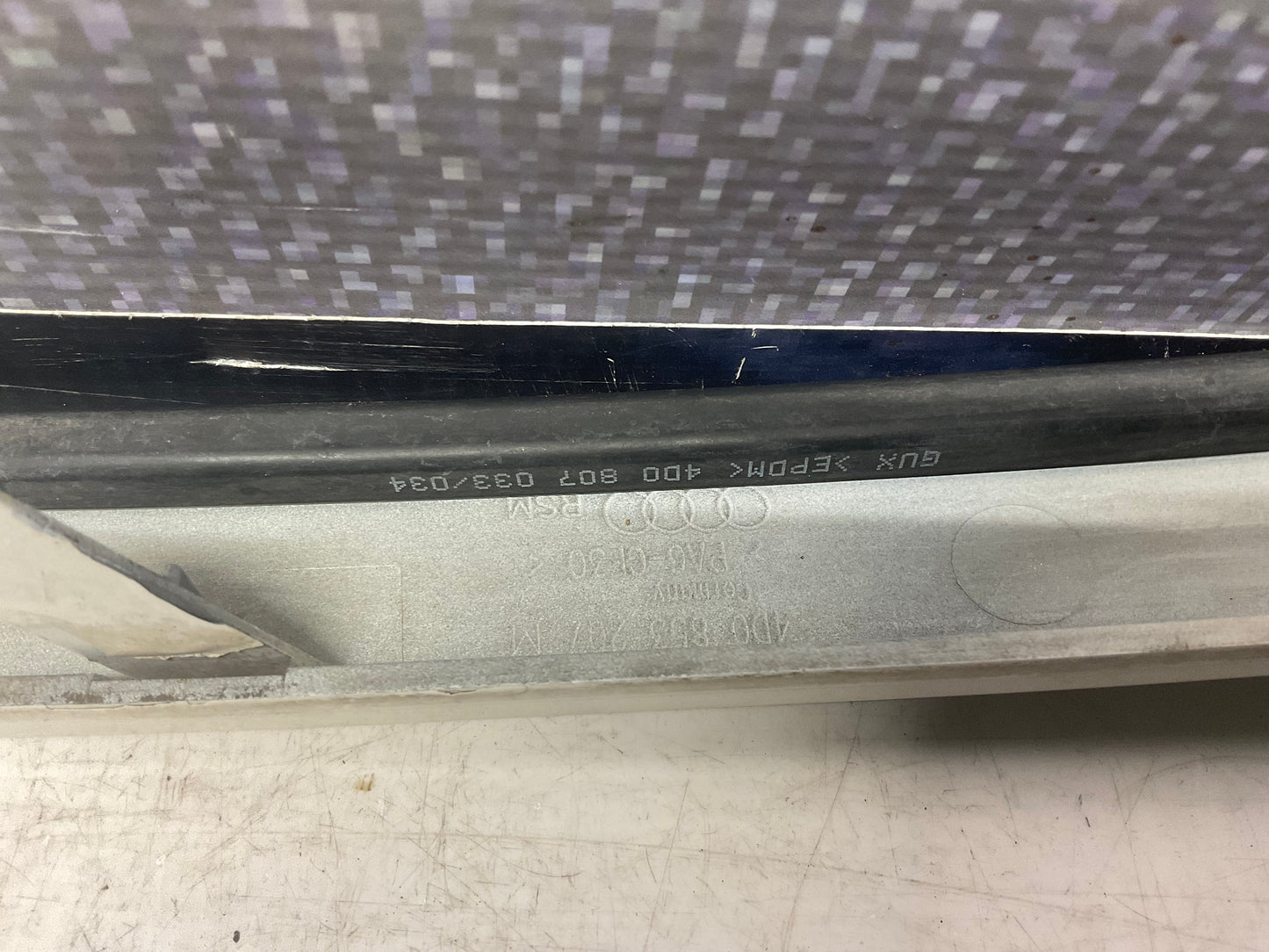 Driver Headlight/Bumper Trim Left  4D0853207M  D2