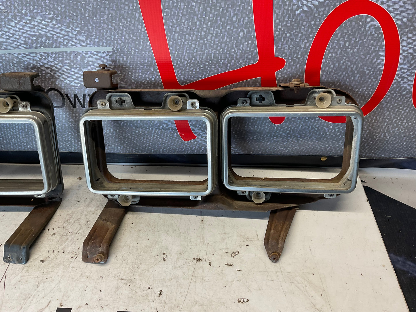 Early Quad Headlight Bracket Pair B2  4000 URQ Coupe