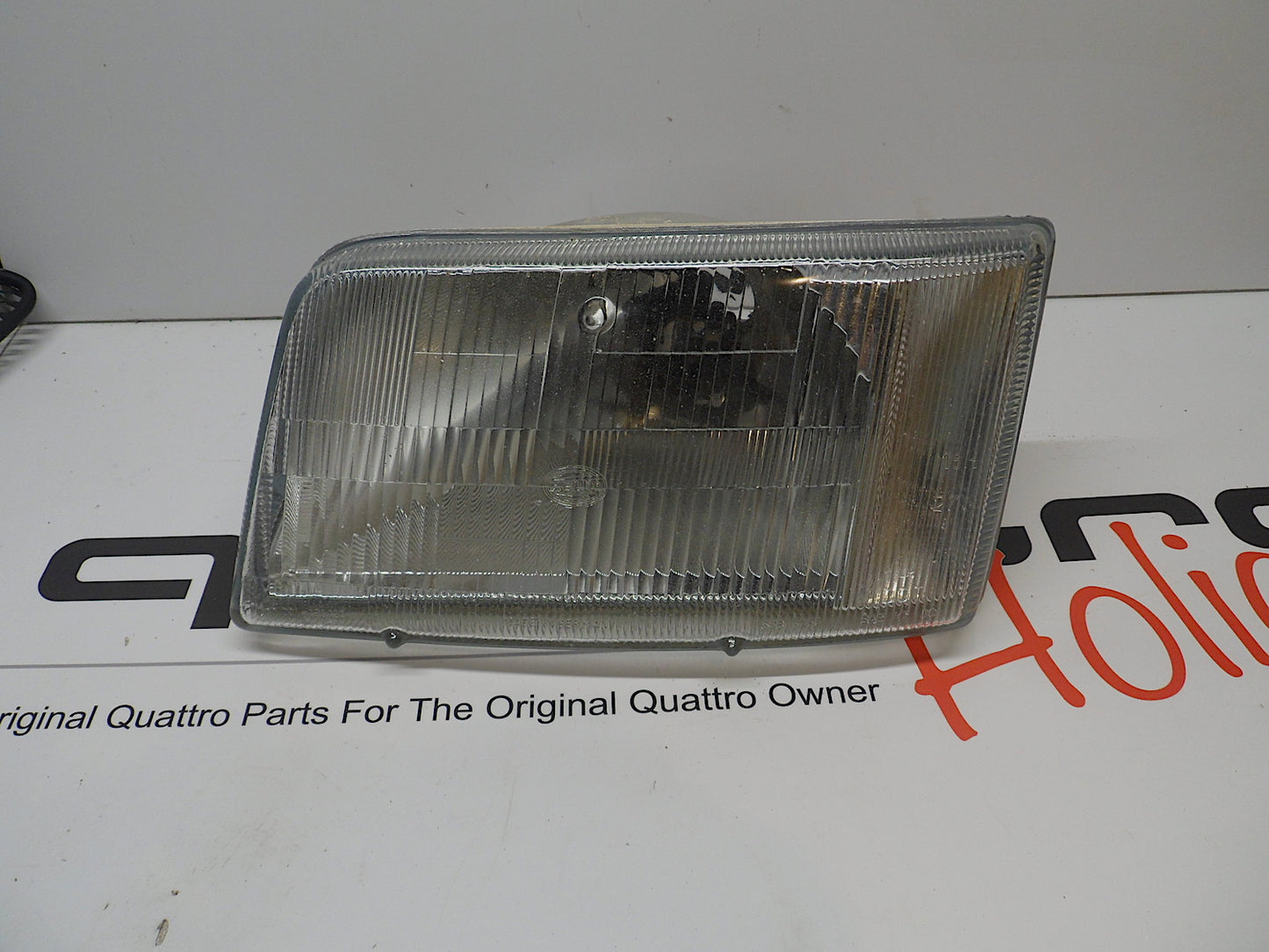 Driver Side Headlight 4A0941003D Hella