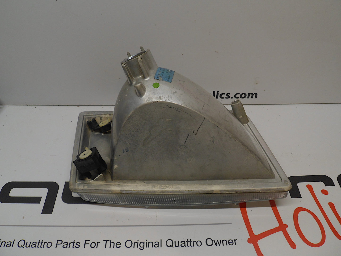 Driver Side Headlight 4A0941003D Hella